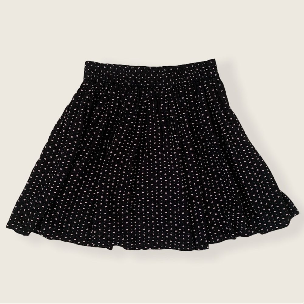 Black skirt with pink heart details